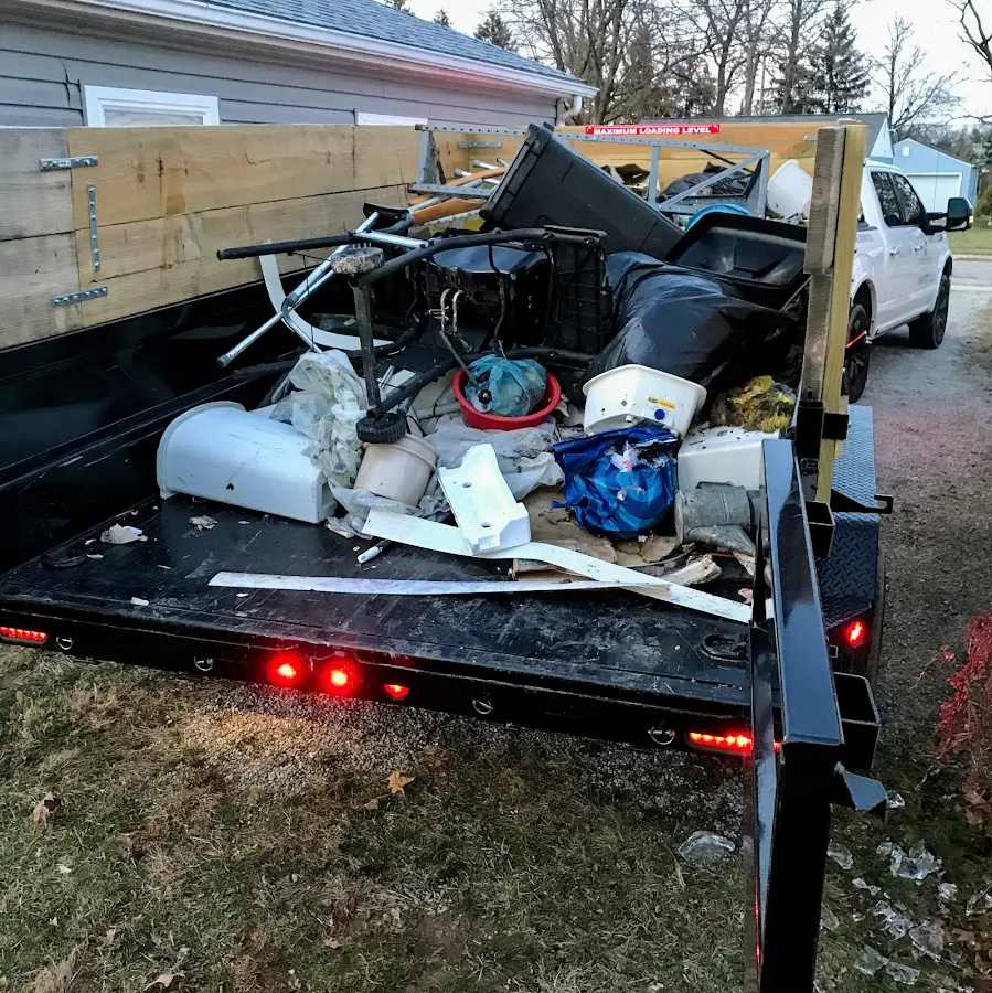 Roll-off dumpster delivered to a residential driveway in Fairburn