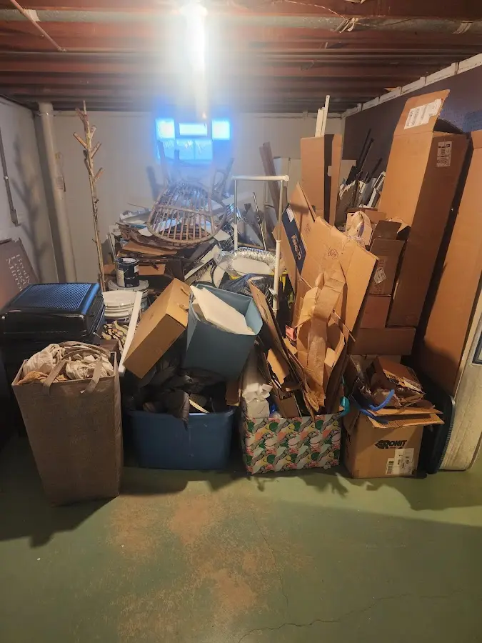 Roll-off dumpster container at job site for Concrete Dumpster Rental in Fairburn